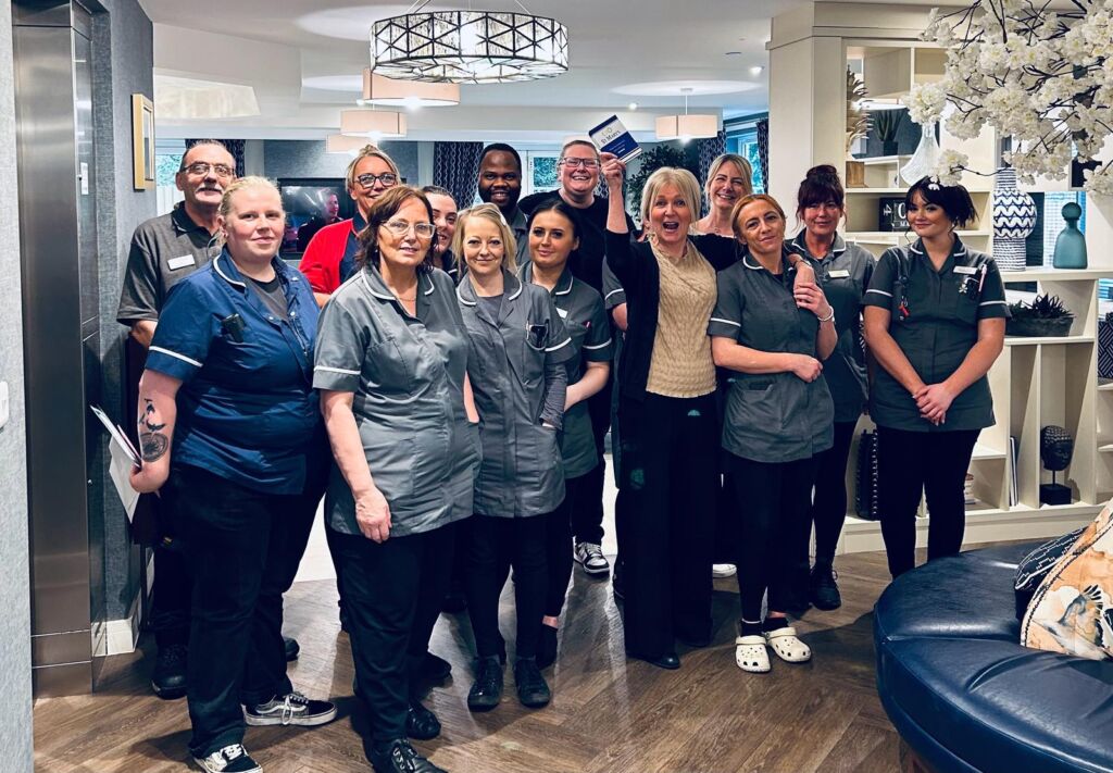 Celebrating Care Home of the Year, the staff at St Mary's Riverside gather for a photograph!