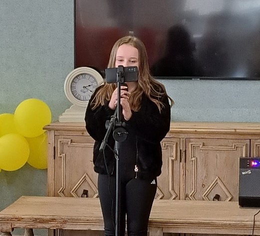 Amazing Gracie Wows Pudsey Residents with Angelic Voice at event at Hutton Manor Care Home for residential and dementia care on the outskirts of Leeds in West Yorkshire.
